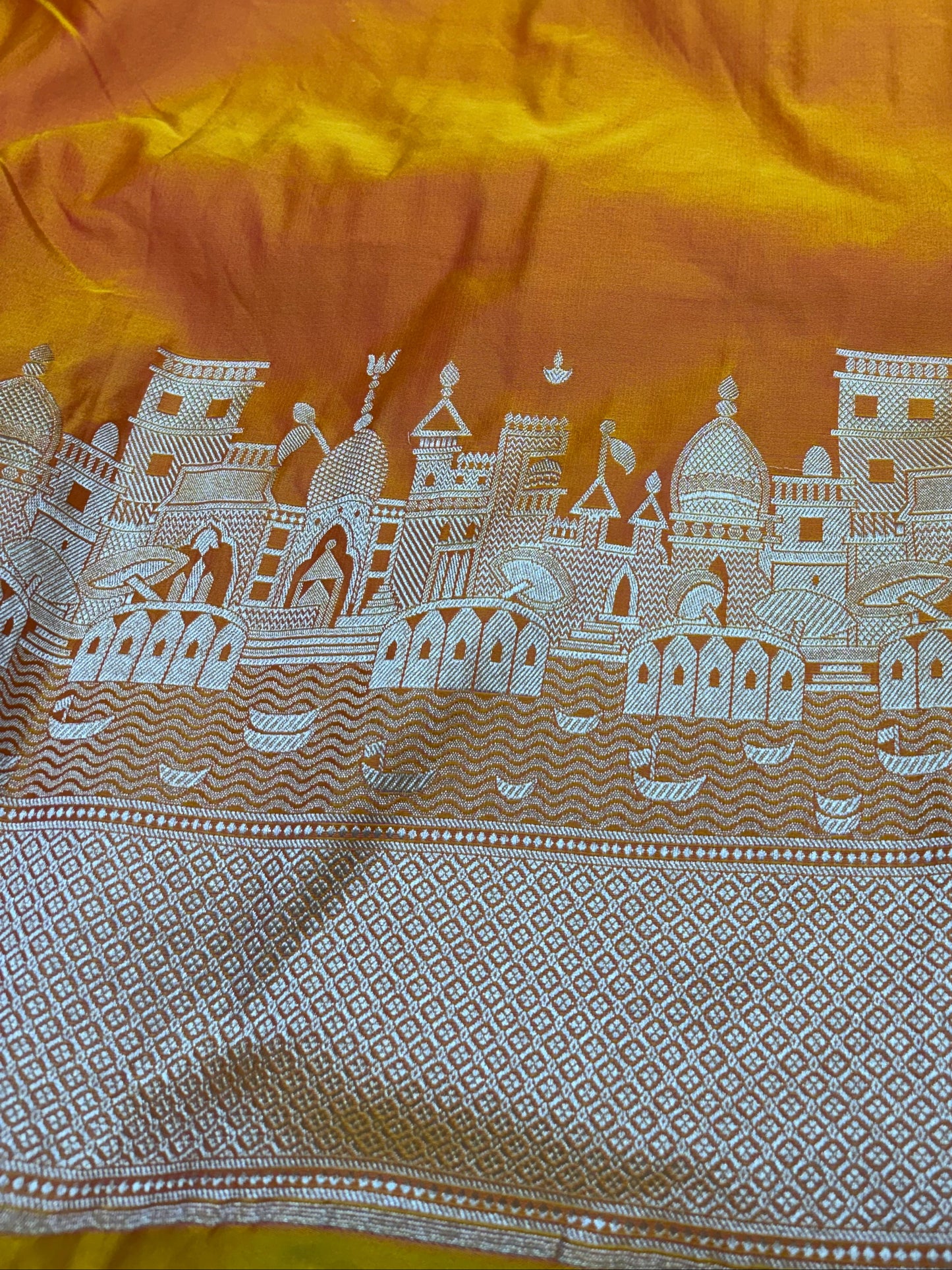 Yellow fabric with white architectural pattern