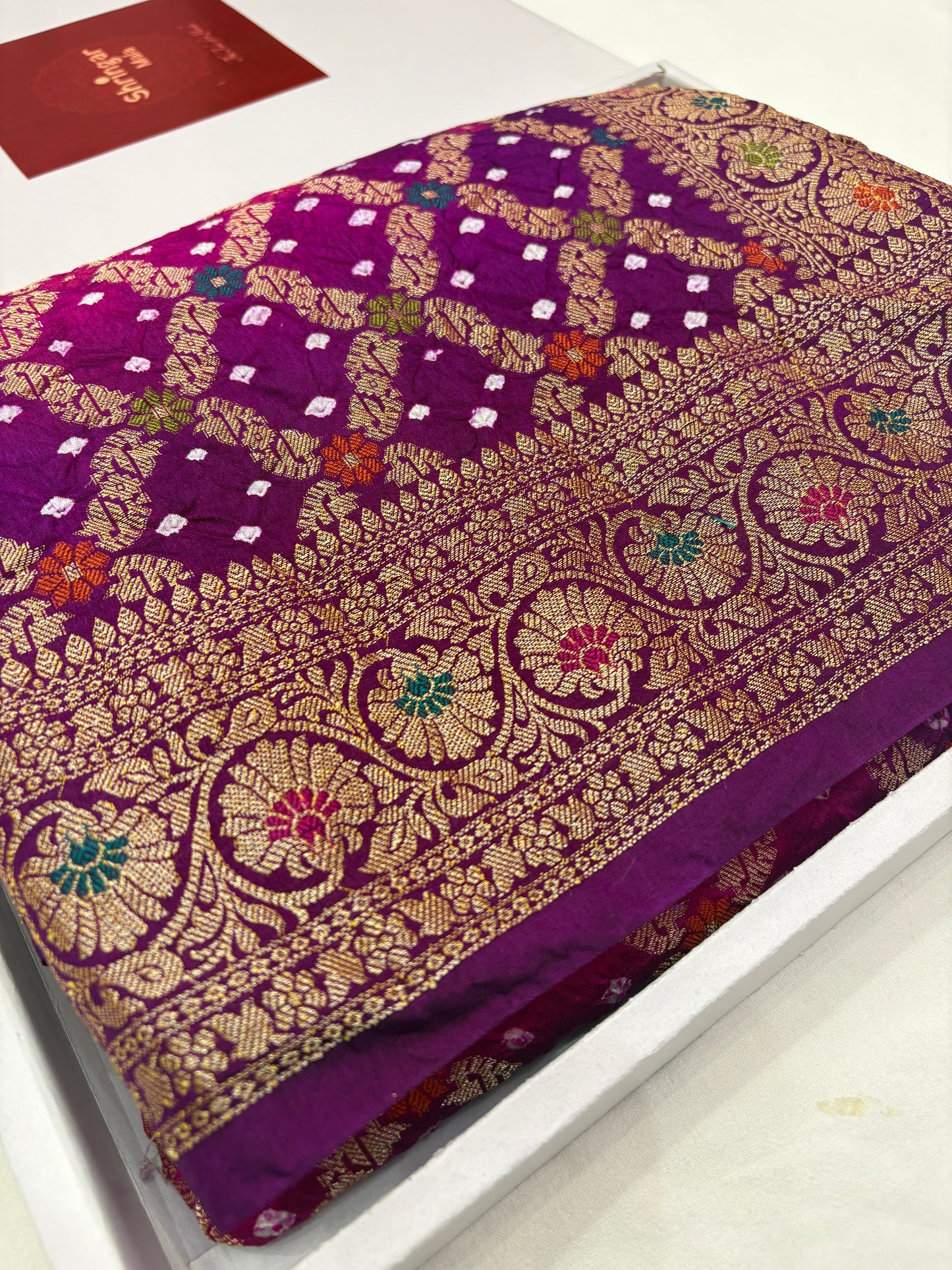 Decorative fabric with intricate patterns in a box