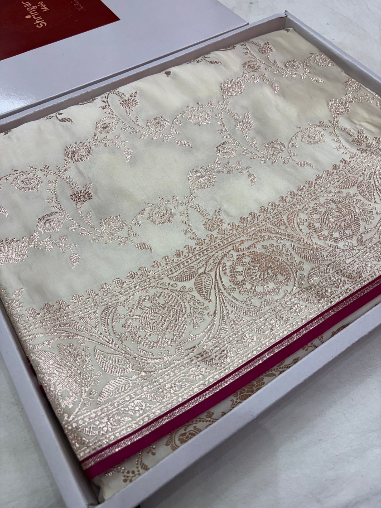 Ivory White Banarasi Katan Silk Saree With Elegant Rose Gold Zari Weaving
