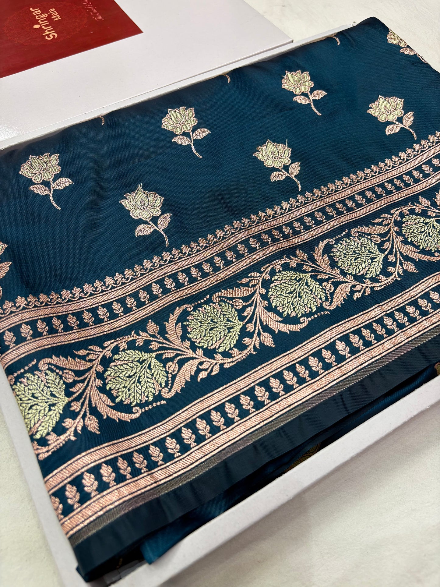 Deep Teal Banarasi Katan Silk Saree With Elegant Floral Zari Weaving