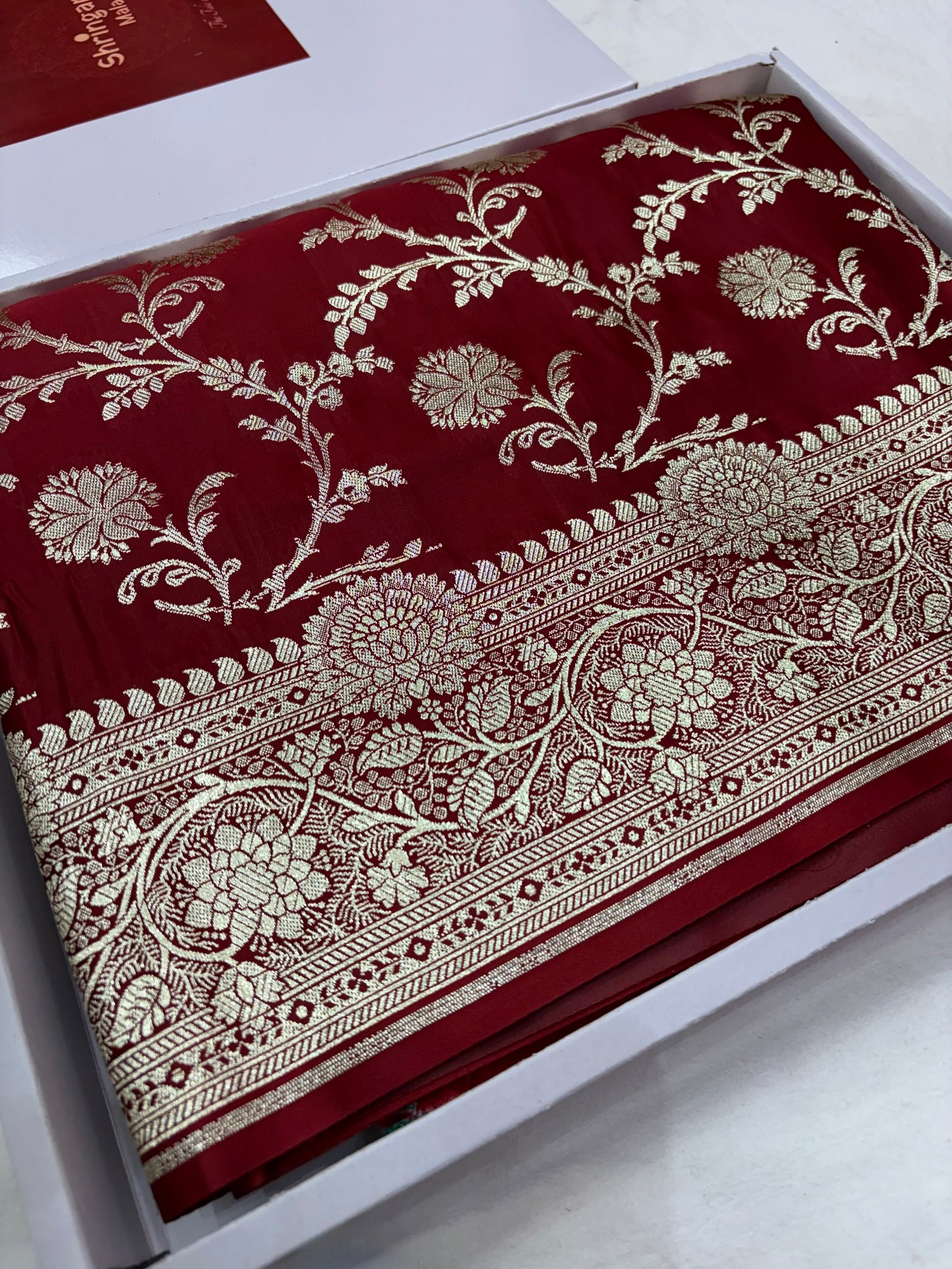 Maroon Banarasi Katan Silk Saree With Intricate Silver Zari Floral Weaving