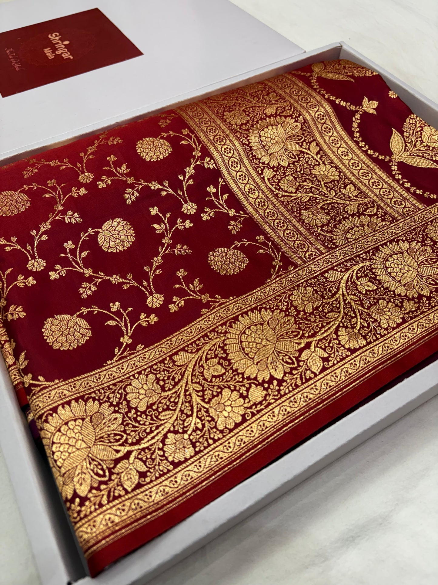 Deep Maroon Plain Katan Banarasi Silk Saree with Light Copper Zari Jaal Work