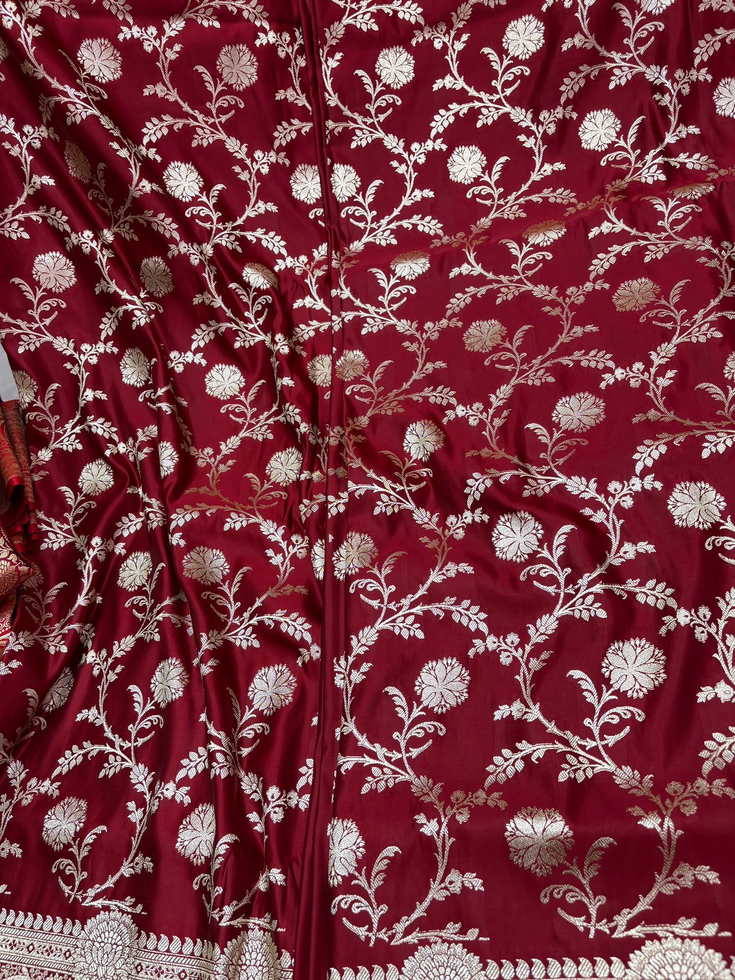 Maroon Banarasi Katan Silk Saree With Intricate Silver Zari Floral Weaving
