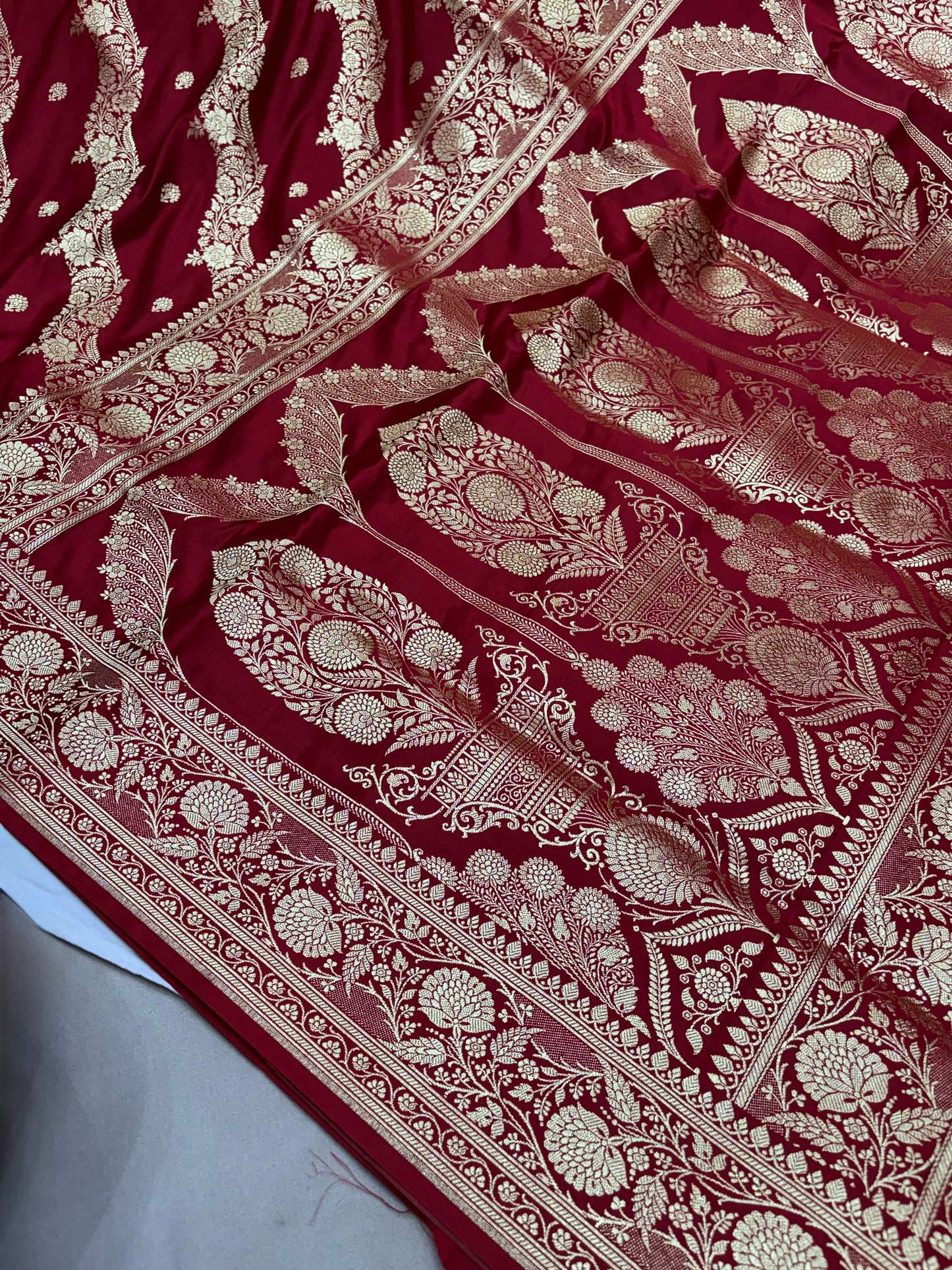 Adaa – Deep Maroon Katan Banarasi Silk Saree with Gold Zari Leheriya Weaving