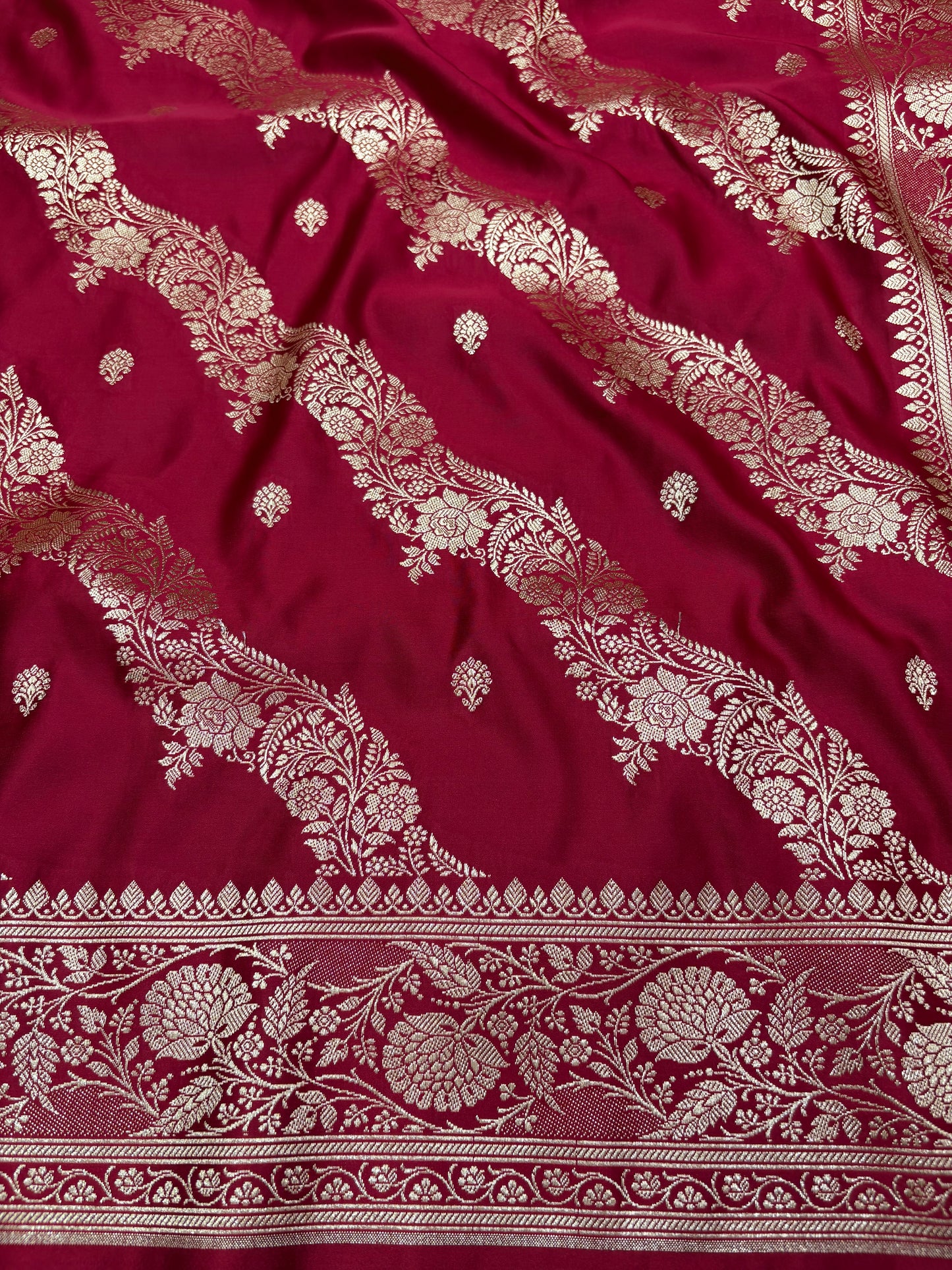 Adaa – Deep Maroon Katan Banarasi Silk Saree with Gold Zari Leheriya Weaving