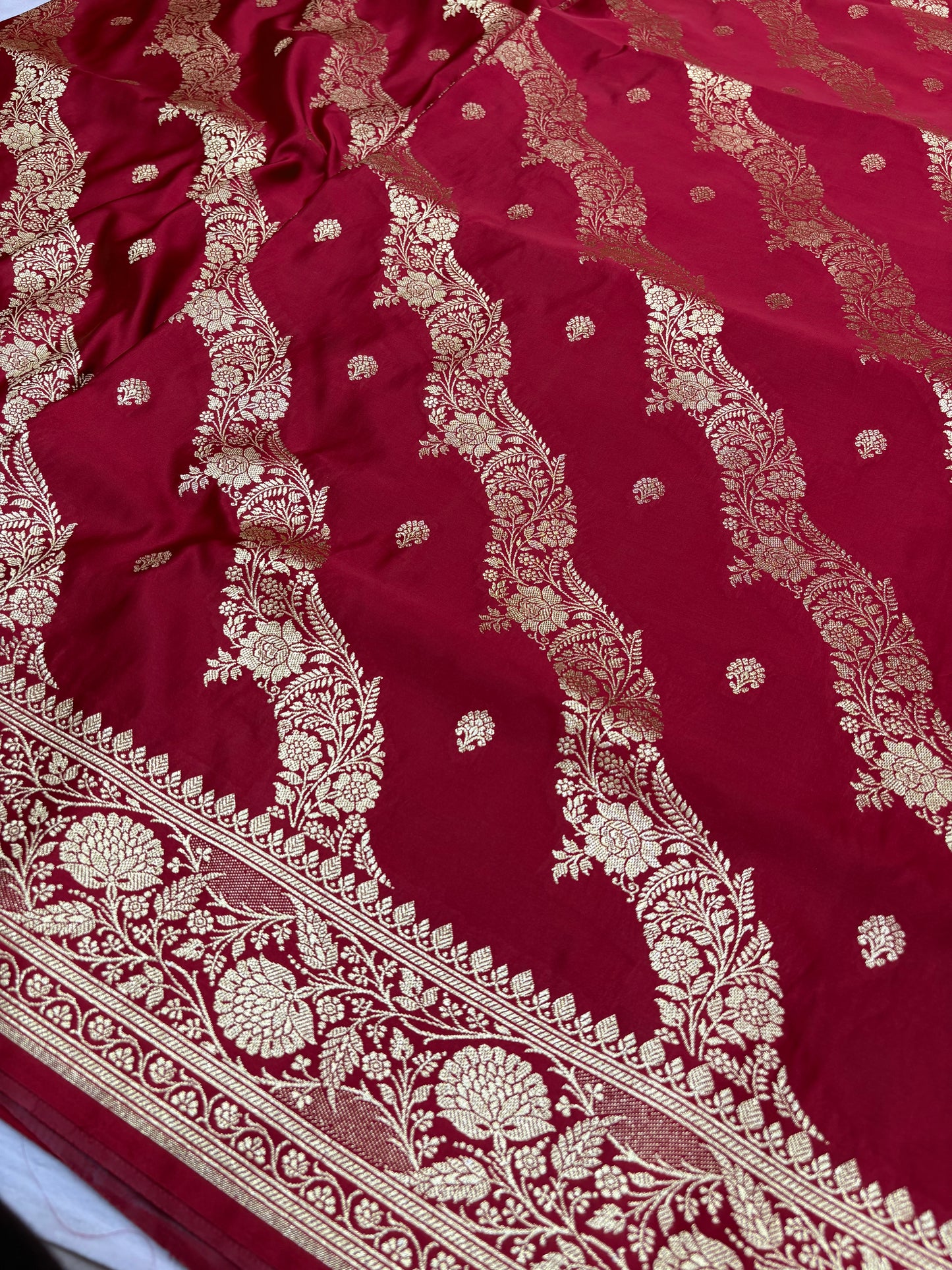 Adaa – Deep Maroon Katan Banarasi Silk Saree with Gold Zari Leheriya Weaving