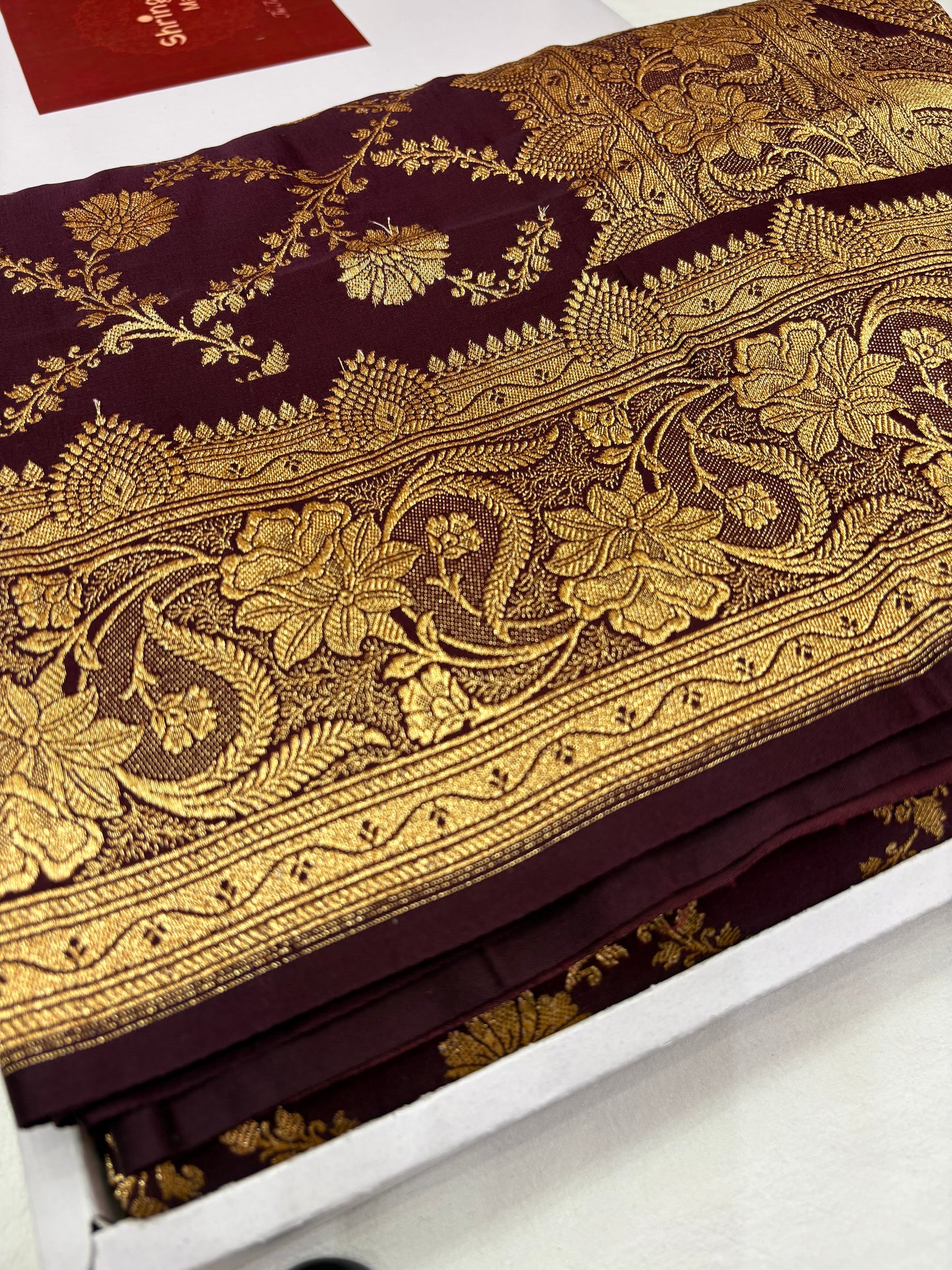 Brown Katan Banarasi Saree with Floral Jaal and Ornamental Border
