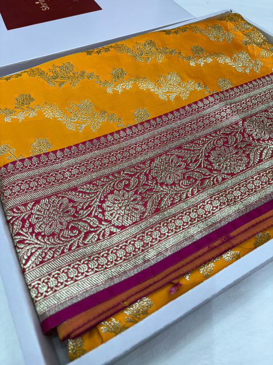 Mustard Yellow Katan Banarasi Saree with Rani Pink Contrast Border and Floral Jaal