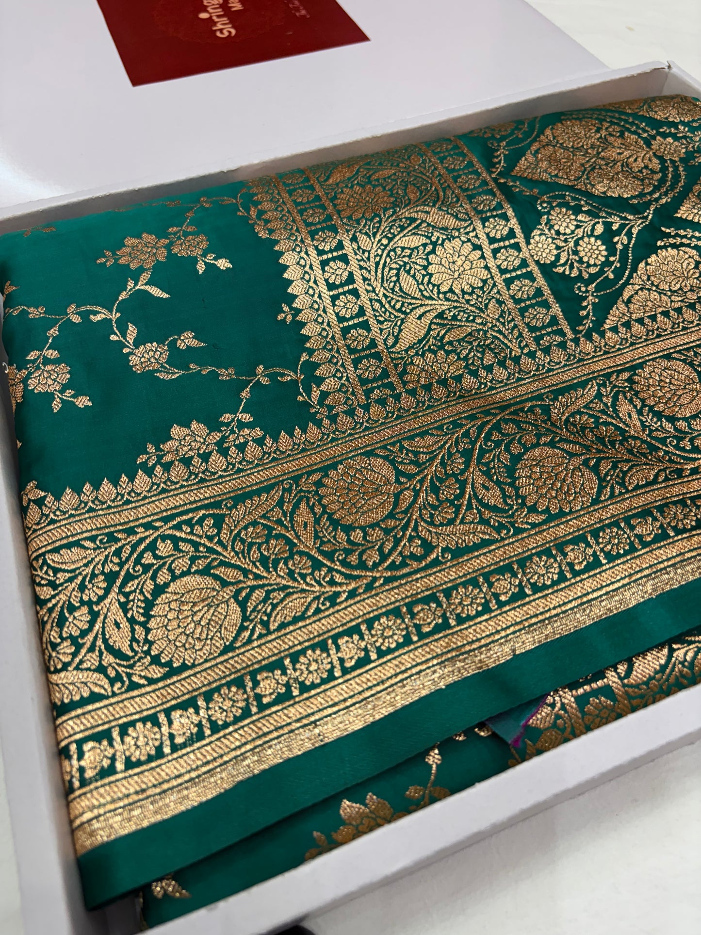 Rama Green Katan Banarasi Saree with Floral Jaal Weaving and Rich Traditional Pallu