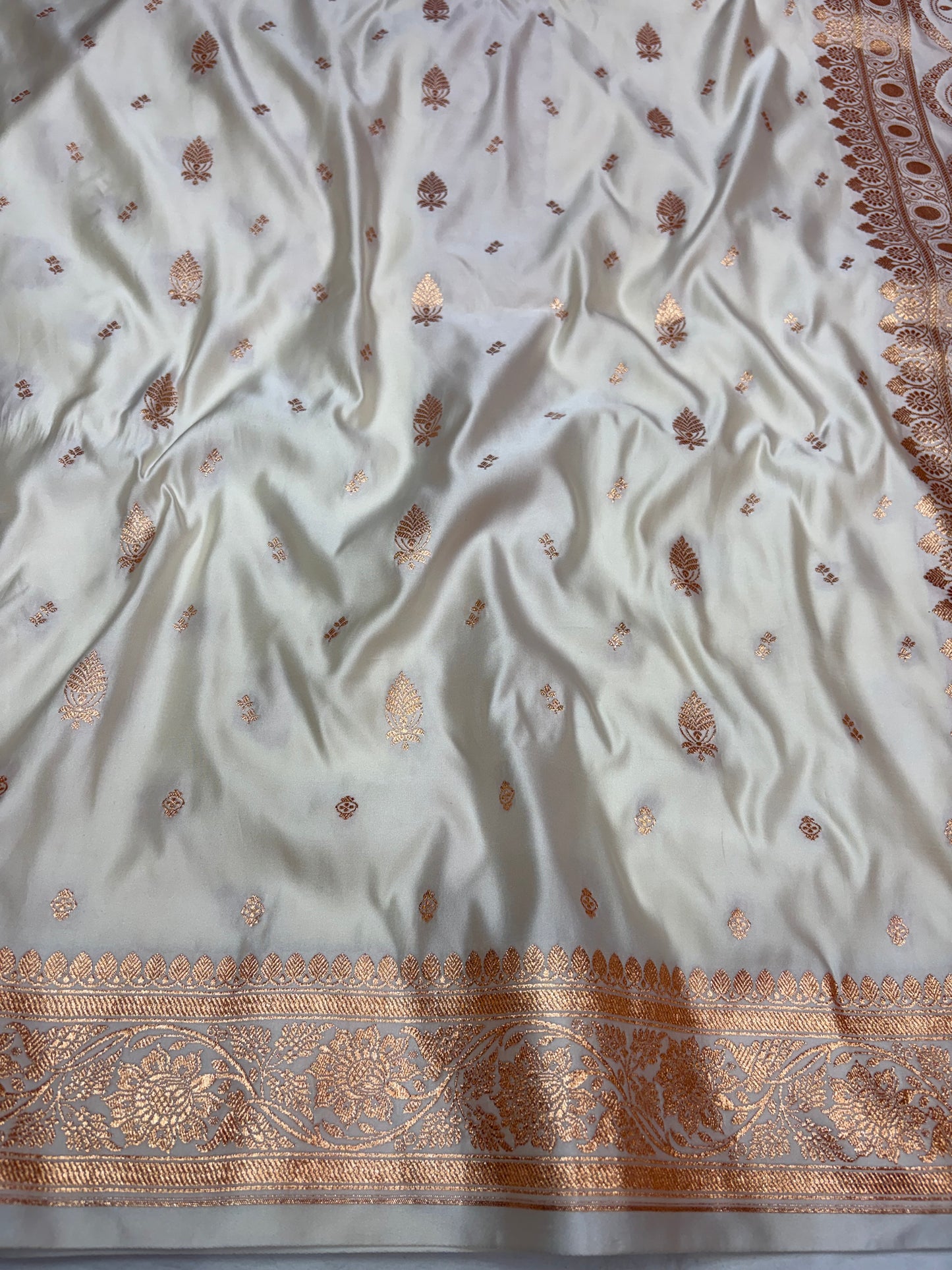 Ivory Cream Katan Banarasi Saree with Copper Zari Buti and Ornamental Pallu
