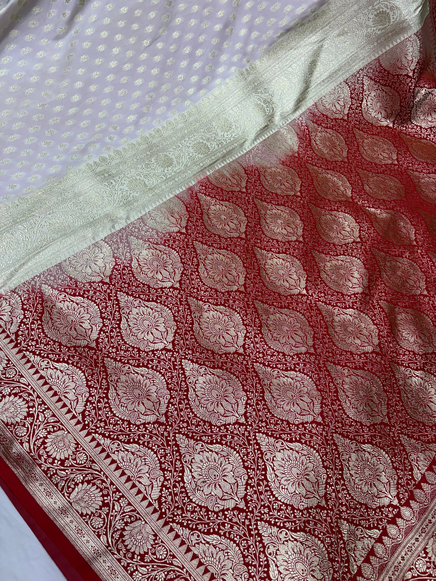 Ivory Katan Pastel Banarasi Saree with Red Contrast Border and Ornamental Pallu