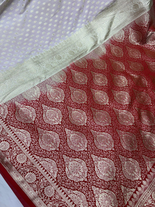 Ivory Katan Banarasi Saree with Red Contrast Border and Ornamental Pallu