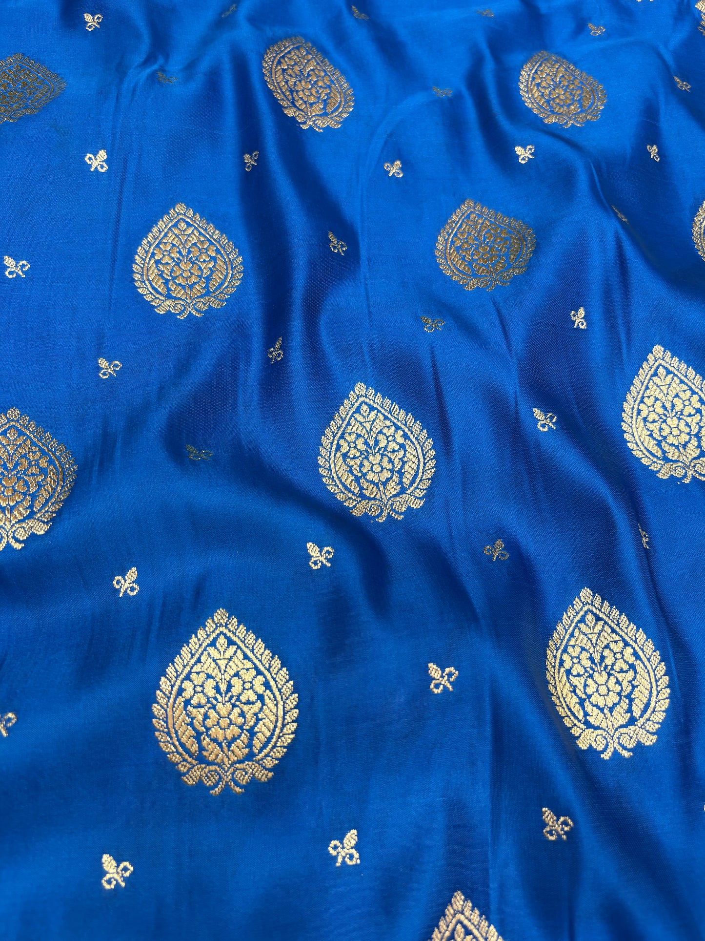 Peacock Blue Katan Banarasi Saree with Paisley Buti and Ornamental Pallu