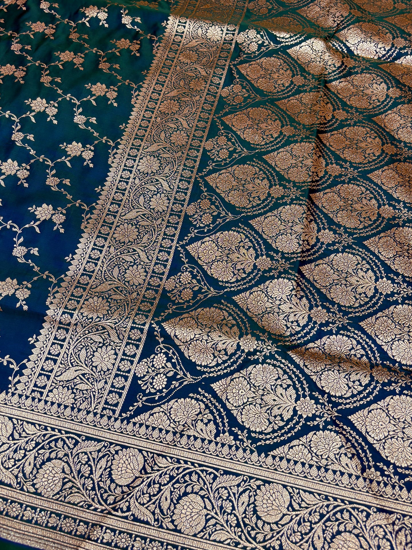 Petrol Blue Katan Banarasi Saree with Floral Jaal Weaving and Rich Woven Pallu