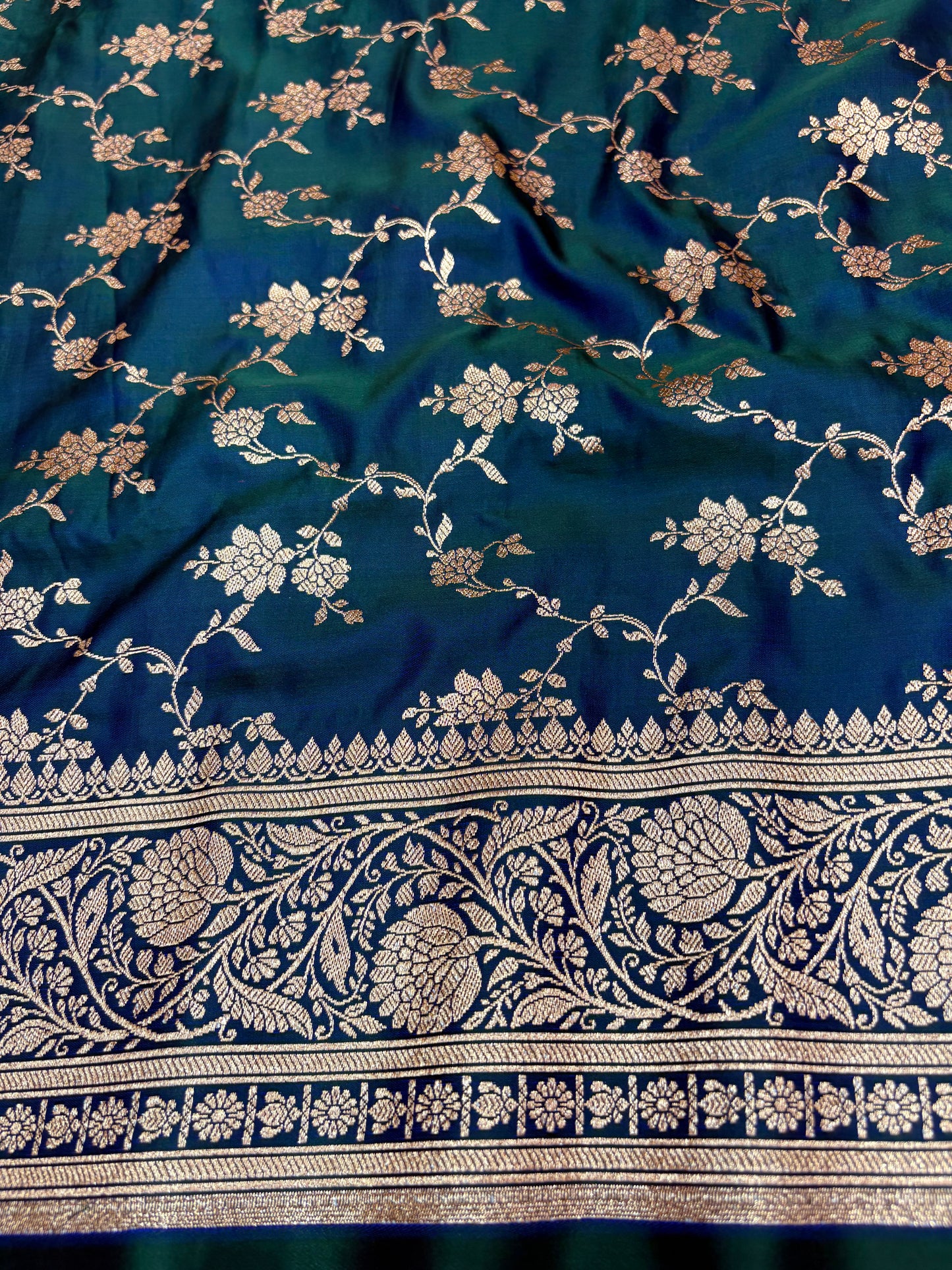 Petrol Blue Katan Banarasi Saree with Floral Jaal Weaving and Rich Woven Pallu
