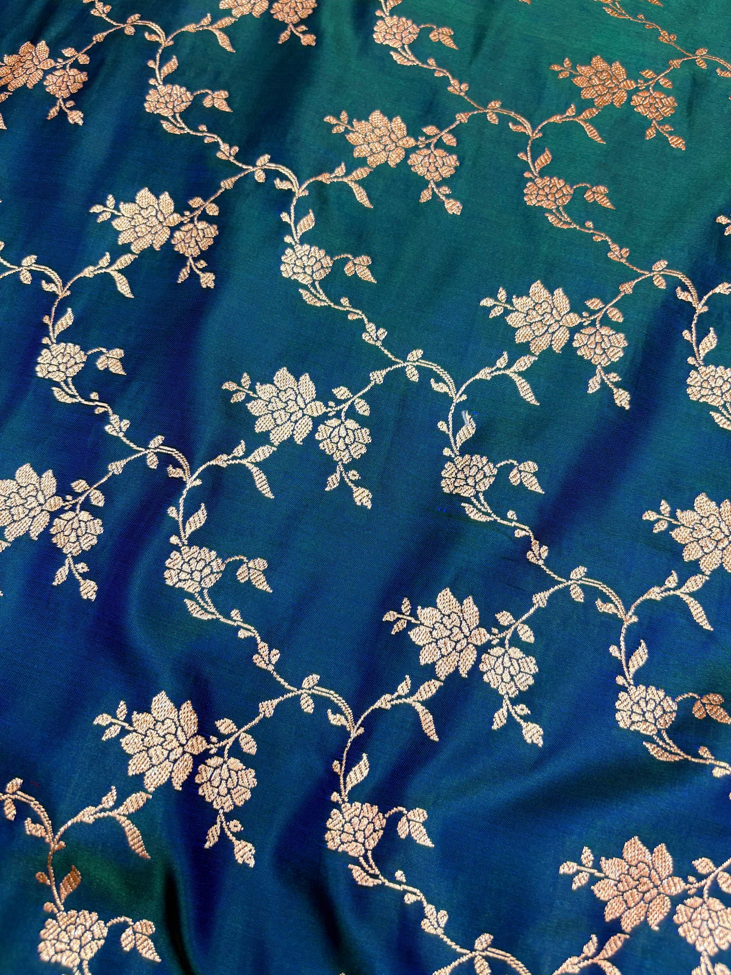 Petrol Blue Katan Banarasi Saree with Floral Jaal Weaving and Rich Woven Pallu