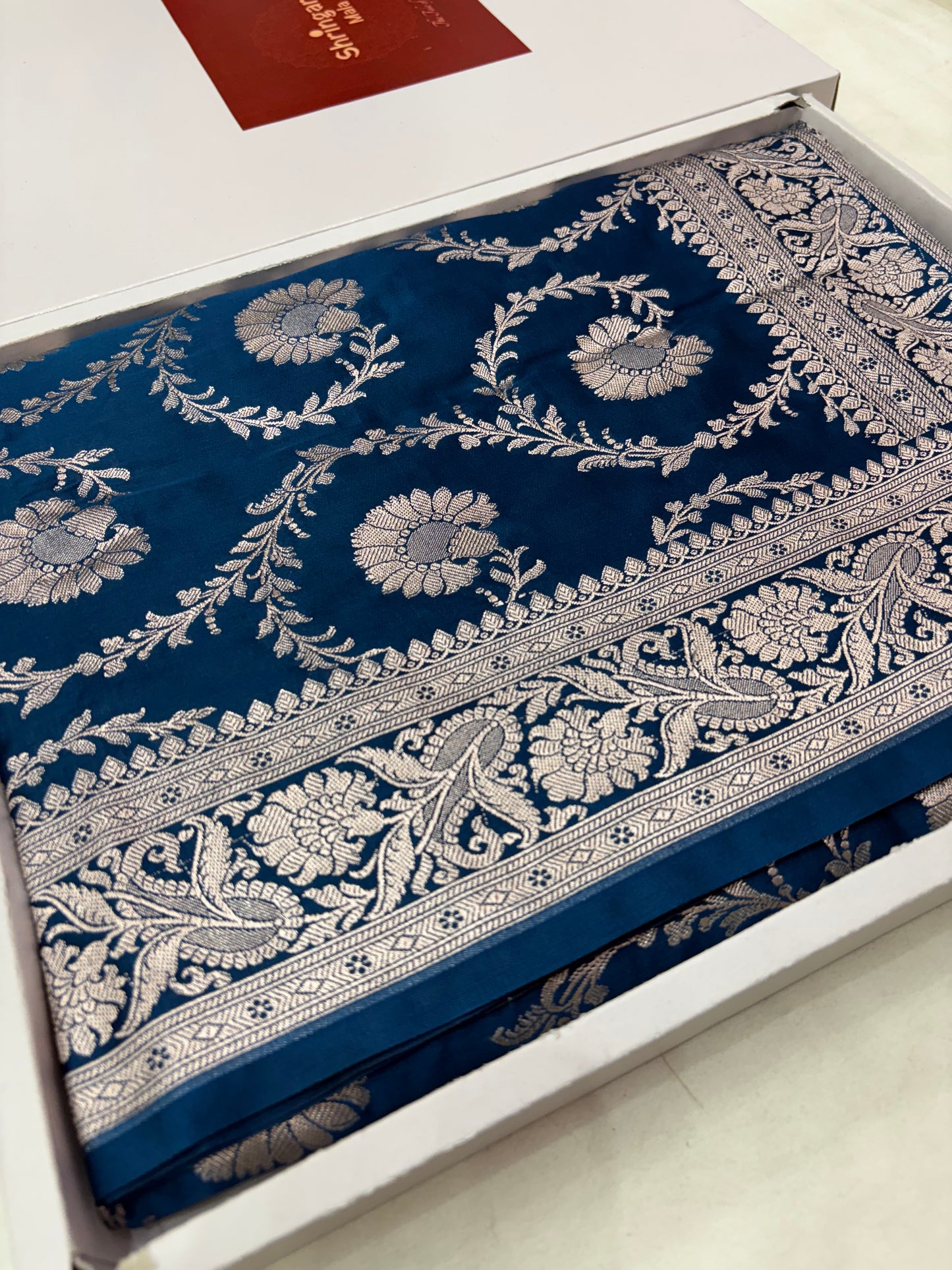 Teal Blue Mashru Katan Banarasi Saree – Silver Zari Floral Jaal