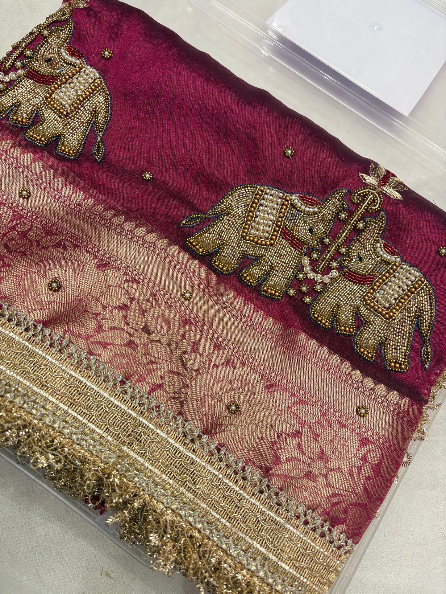 Wine Tissue Saree with Handcrafted Zardozi Elephant Motifs (T7)